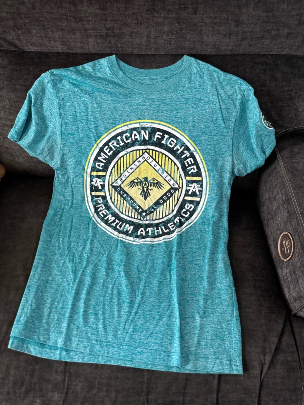 American Fighter Teal Graphic Tee with Yellow Accent Logo